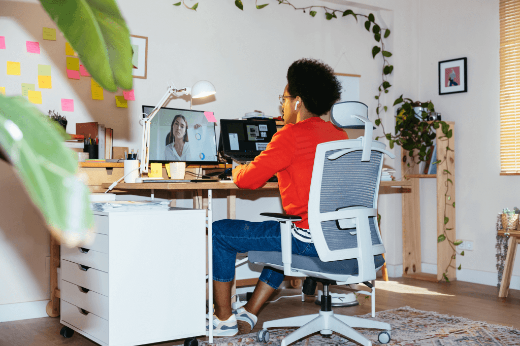 Young Man Sitting at Home Office