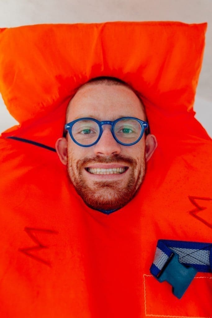 man in life preserver